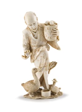 A Japanese ivory okimono of a goose carer, Meiji period, 1868-1912