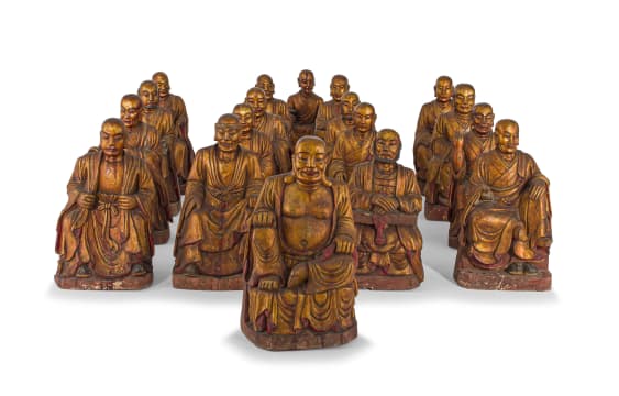Seventeen Chinese giltwood Lohans and a figure of Buddha, Qing Dynasty, 19th century