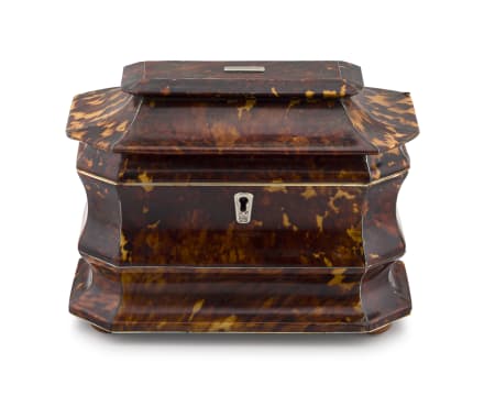 An early Victorian tortoiseshell tea caddy