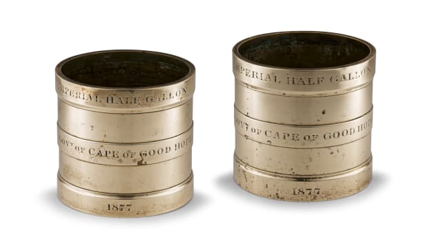 A pair of brass Cape of Good Hope Imperial Half Gallon measures, 1877