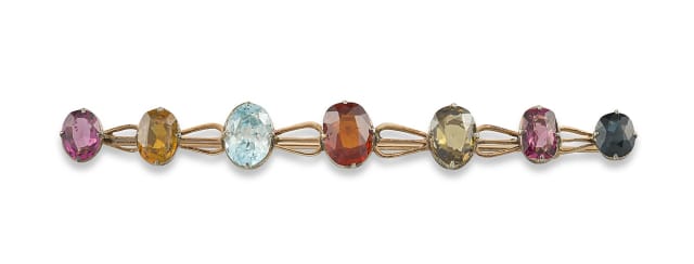 Gem-set and gold bar brooch