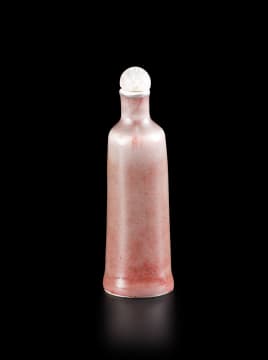 A Chinese plum-glazed snuff bottle, Qing Dynasty, 19th century