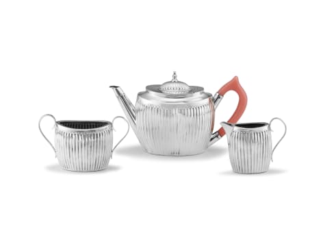 A three-piece Victorian silver tea service, William Hutton & Son, London, 1894