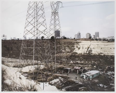 David Goldblatt; Squatter camp, slimes dam and the city from the southwest, Johannesburg. 12 July 2003