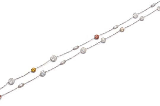 Platinum multi-shaped diamond wrap bracelet