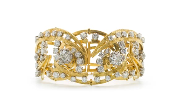 18k two-tone gold and diamond hinged bracelet