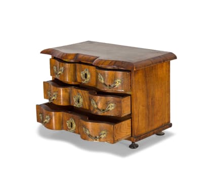 A walnut bombé apprentice chest of drawers, 19th century