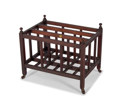 An Arts and Crafts mahogany canterbury, 19th century