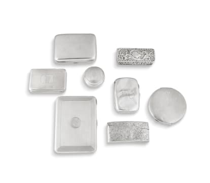 A collection of seven English silver boxes and a mirror, various makers and dates