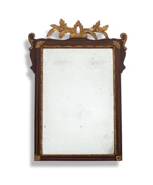 A Georgian walnut and parcel-gilt wall mirror, 18th century