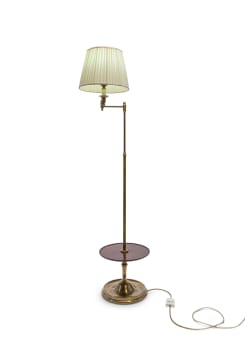 A brass adjustable standing lamp