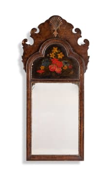 An early Georgian walnut gilded and painted wall mirror, London, 18th century