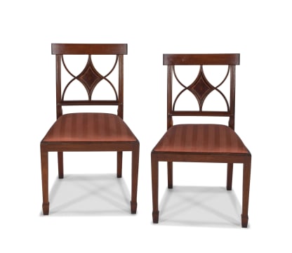 A pair of Sheraton style mahogany dining chairs, 20th century