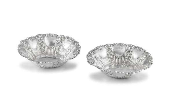 A pair of George V silver bonbon dishes, maker's marks worn, Birmingham, 1910