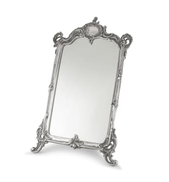 A silver-plated easel back mirror