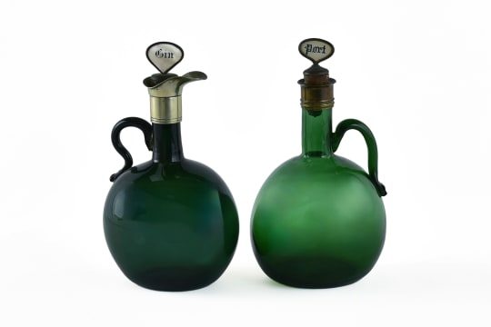 Two green glass port and gin decanters, 19th century