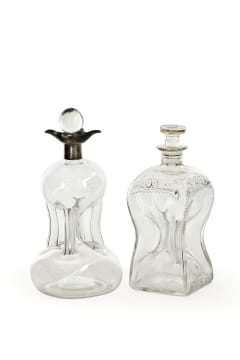 A George V glass silver-mounted decanter, Hukin & Heath, Birmingham, 1925; and another