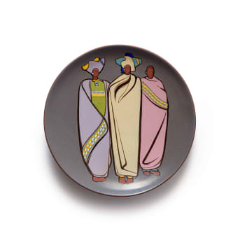Kalahari Studio; Plate decorated with three figures wrapped in blankets