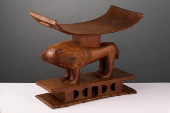 Ashante stool with lion emblem, Ghana