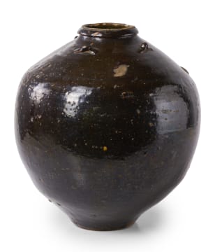 A Batavian stoneware storage jar with black glaze, early 18th century