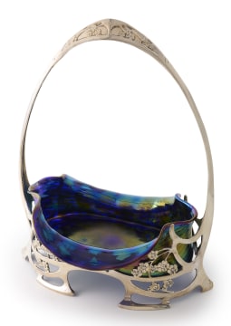 An Art Nouveau pewter and glass basket, 20th century