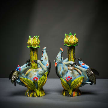 Ardmore Ceramic Studio; Pair of warthog candlesticks
