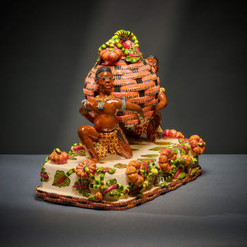 Ardmore Ceramic Studio; Zulu figures with lidded vessel