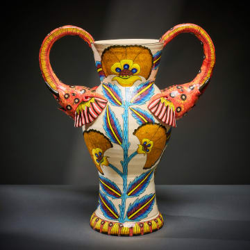 Ardmore Ceramic Studio; Orange elephant vase with handles