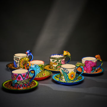 Ardmore Ceramic Studio; Set of six animal espresso cups and saucers