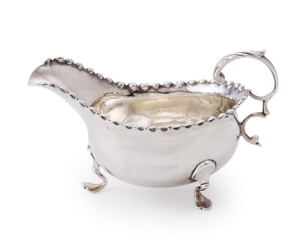 A George III gravy boat, maker's mark worn, London, 1774