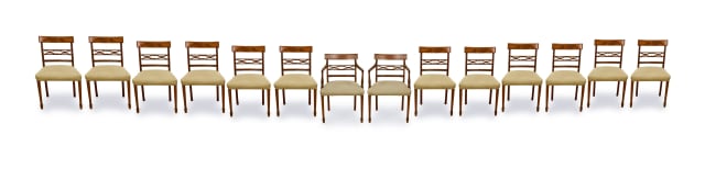 Set of fourteen Regency style mahogany dining chairs, 19th century