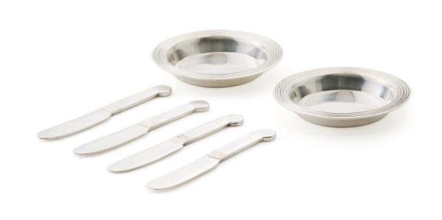 A pair of French silver-plated Christofle bowls and four butter knives
