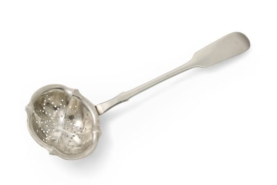 A Russian fiddle pattern silver tea strainer, c.1880