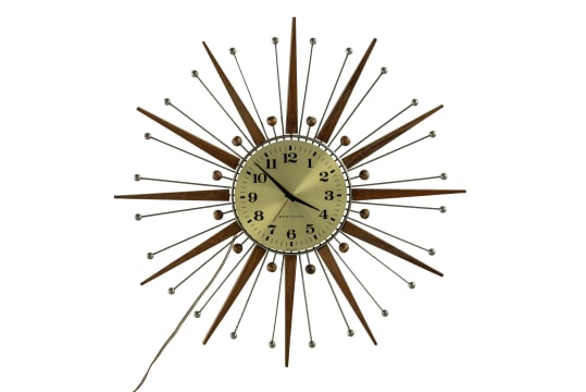 Westclox; Electric atomic-style teak and metal 'Sunburst' wall clock, Scotland