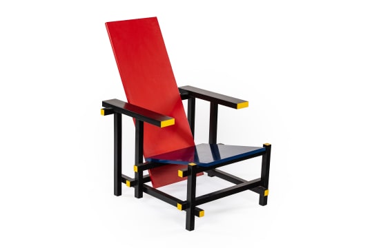 Gerrit Rietveld; 'Red and Blue' armchair after a 1918 design by Gerrit Rietveld,