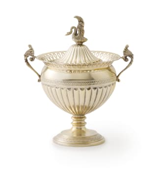 A silver-gilt sugar basin and cover. 800 standard