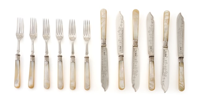 A set of twelve Edward VII silver and mother-of-pearl fish knives and forks, Walker & Hall, Sheffield, 1902