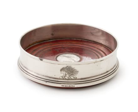 An Elizabeth II sterling silver wine coaster, W I Broadway & Co, 2000, .925 standard