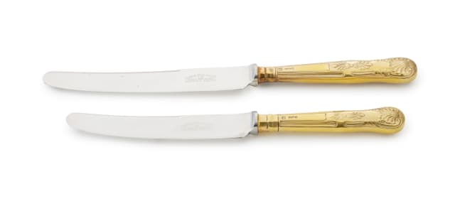 Sixteen Elizabeth II silver-gilt King's pattern knives, Cooper Brothers & Sons Ltd, 1970