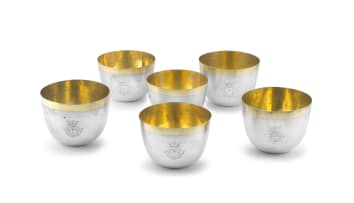 A Dutch silver-gilt traveling set of six liquor cups, 1893- 1905