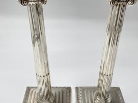 A pair of George II silver Corinthian candlesticks, Elizabeth Cooke, London, date letter worn, possibly 1757
