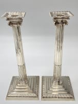 A pair of George II silver Corinthian candlesticks, Elizabeth Cooke, London, date letter worn, possibly 1757