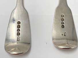 Four George III and George IV silver 'Fiddle' pattern dinner spoons, William Chawner, London, 1815-1826