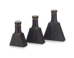 Three Italian black- and cream-glazed decanters and stoppers, Bruno Gambone, late 1970s