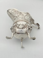 An Irish silver cream jug, apparently unmarked, Dublin, date letter worn, possibly 1760