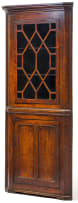 A George III oak corner cupboard