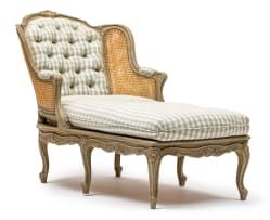 A Louis XVI style grey-painted, caned and upholstered day bed