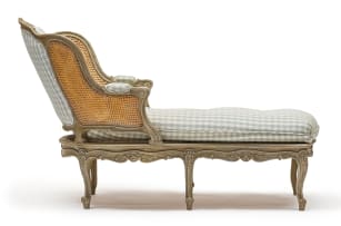 A Louis XVI style grey-painted, caned and upholstered day bed