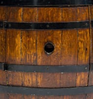 A metal-bound oak barrel
