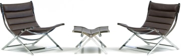 A pair of chrome and leather American Paul Tuttle-style armchairs, modern
